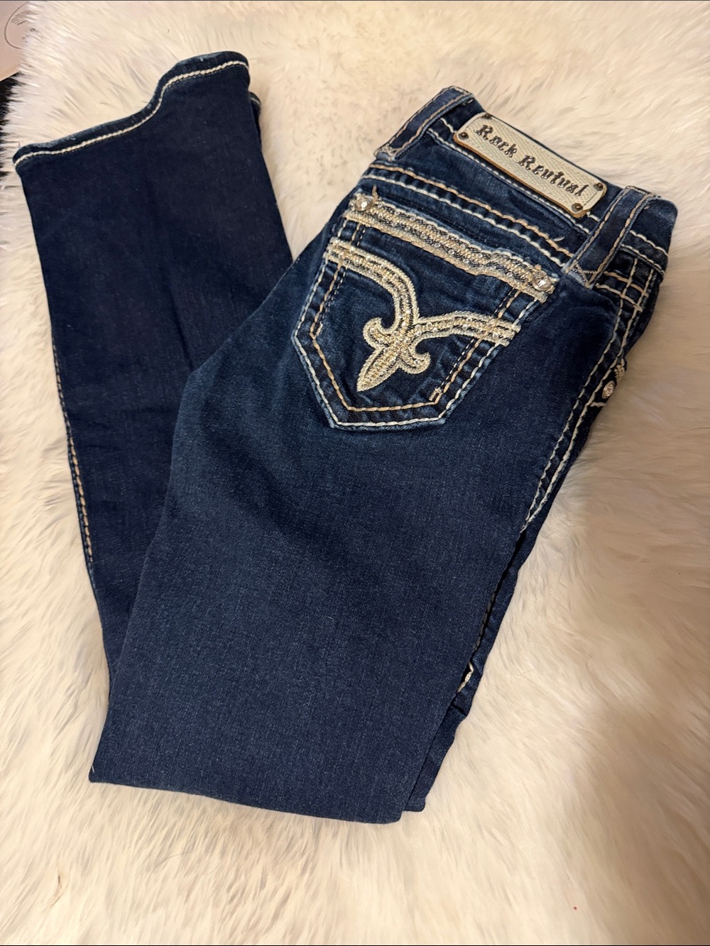 Rock Revival Women's Dark Indigo boot cut Jeans with Embellished Pockets